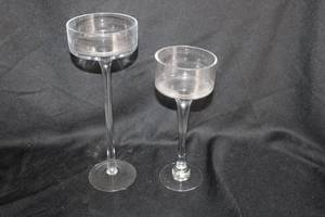 lot 251 image: Clear glass long-stemmed candle holders - 4x12. 5x14 mixed sizes