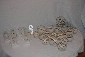 lot 213 image: Antiqued rustic metal balls and silver numbers