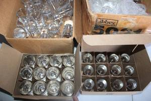 lot 148 image: Generous amount of 1 oz. Clear glasses 3 tall