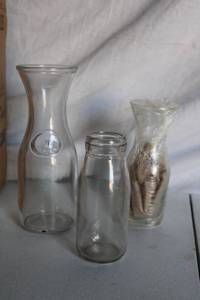 lot 153 image: Clear glass carafes and jars mixed sizes