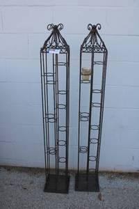 lot 171 image: Pair of wrought iron votive candle stands
