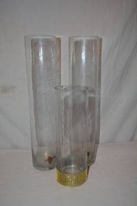 lot 91 image: Clear Glass Vases - (10) 4W x 18 Tall, (2) 4W x 12 Tall