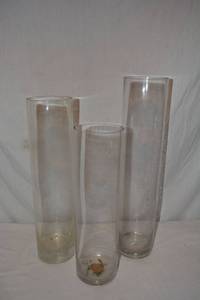 lot 96 image: Mixed Clear Vases - (1) 4W x 14Tall, (1) 4W x 16 Tall, (8) 4W x 18 Tall