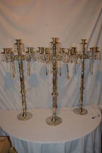 lot 105 image: (3) Silver candelabras 32 Tall x 16W (some dangles may be missing)