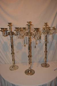 lot 106 image: (3) Silver candelabras 32 Tall x 16W (some dangles may be missing)