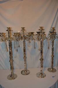 lot 107 image: (4) Silver candelabras 32 Tall x 16W (some dangles may be missing)