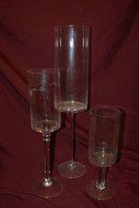 lot 119 image: (3) Clear Long-stemmed Pedestal Candle Holders mixed Sizes - 4.5x14, 4.5x20, 505x26