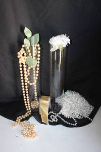 lot 274 image: Clear glass cylinders (open at both ends) 3x15 approx. 17 plus (1) vase. Beads included.