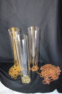 lot 275 image: Clear glass cylinders (open at both ends) 3x15 approx. 17. Beads included.