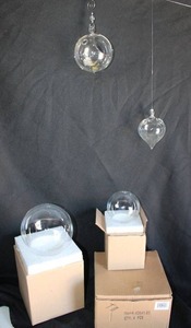 lot 276 image: Clear glass globes and terrariums as shown