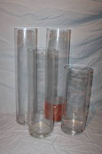 lot 319 image: (4) Clear round vases mixed sizes - 5x16 to 5x24