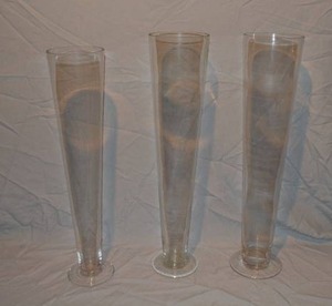 lot 262 image: (3) Clear Pilsner vases - (2) 6x29, (1) 5x27