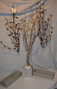 lot 172 image: Glittery tree with silver base, (2) heavy steel gray boxes and metal taper candle holders - (2) 3 metal leaves, (1) 4 silver glitter tree