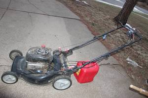 lot 8 image: Self Propelled Briggs and Straton Lawn Mower and 5 Gallon Gas Can Very Little usage (CHARLIE NOT INCLUDED)