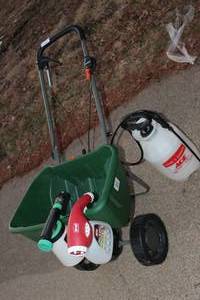 lot 9 image: Scotts Turf Builder Broadcast Spreader, Two Hose attacthment Sprayers and Pump Sprayer