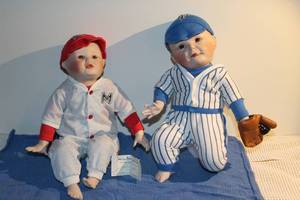 lot 18 image: $ Vintage Michael & Paul Porclain Dolls by Ashton-Drake Galleries 1 has a baseball mit These are in great Condition