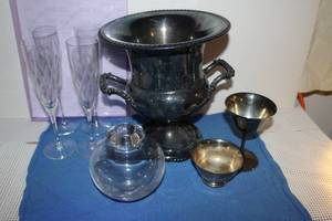 lot 24 image: Silver Plated Bottle Chiller, Silver plated Stemware, Four Champagne Flutes with etched Design and Heavy Short Glass Vase.