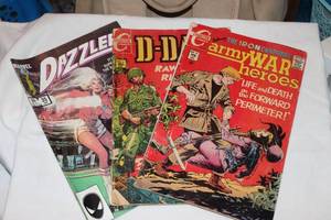 lot 50 image: Vintage Comic Books,  Marvel Dazzler and 2 Charlton War Titles, Please see Pictures