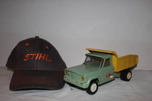 lot 63 image: Tonka Truck with Dump style Truck bed..Near Mint Condition and Unworn Stihl Ball Cap