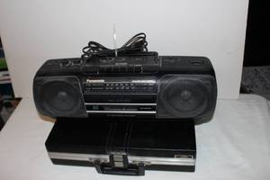 lot 68 image: Vintage Portable Cassette Radio Player with Very Generous Selection of Cassettes in Carry Case.  Titles as shown in pictures