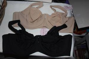 lot 91 image: Cacique Bras, With Tags Still Attached (1) Beige in Color (1) Black in color, Both size 44DD
