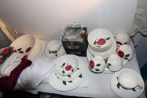 lot 115 image: Vintage Apple dishes Hand Painted Under the Glaze Southern Made in the USA, Fade Proof, Oven Proof, Crystal Apple Serving Dishes in Orginal Boxes and table Cloths (3) White, Burgundy, and a White Ruffle One