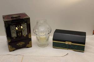 lot 14 image: $$ Vintage Japanese Jewelry Box, Wood with Brass Hardware and Hand Carved Jade inlays, Comes with Brass lock and key, Drawers are lined with Silk.  Christian Dior Posion Box with Contents and Candle Holder