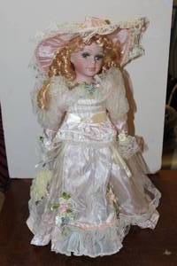 lot 149 image: Vintage Heritage House Ribbons & Bows Laura Doll Collectors Doll Plays You light up my life