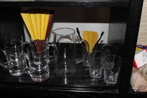 lot 236 image: Four Heavy Bottom Crystal Mugs, Crystal Pitcher, 4 Small Tumblers and 2 Asian inspired Fans