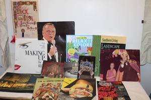 lot 238 image: Variety of Paper Collectables, Frank Senatra picture magazine, Vintage LSU Football Programs, Rex Ball Invitation Reprint, Makeup Book, and more