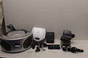 lot 261 image: Misc. Electrontic Items CDRadio player, Portable CD Player, Battery Charger and other Items as shown