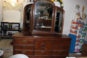 lot 136 image: Thomasville Dresser and Mirror it is 76x19x81 With Mirror (32 without Mirror)