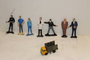 lot 266 image: Collectable Vintage James Bond Character Figures Goldfinger, Man in Blue and others, Matchbox Truck as well