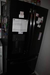 lot 289 image: GE French Door Refrigerator, This is currently in use by owners and will need to be picked up the morning of the 24th at 10am NO EXCEPTIONS