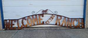 lot 1 image: LARGE 118 L x 31 H METAL WELCOME TO THE RANCH SIGN AS SHOWN. CHECK IT OUT
