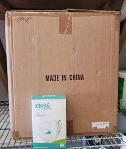 lot 46 image: CASE OF KN95 MASKS AS SHOWN. APPROX. 70 BOXES WITH 10 MASKS EACH.