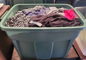 lot 48 image: CONTAINER LOT OF ASSORTED CLOTHING AS SHOWN. NICE MIXED LOT SOME MAY HAVE TAGS.