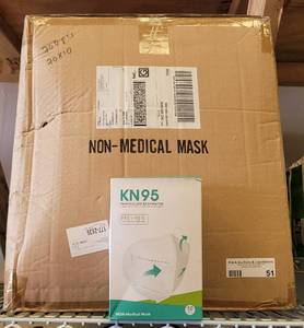 lot 51 image: CASE OF KN95 MASKS AS SHOWN. APPROX. 70 BOXES WITH 10 MASKS EACH.