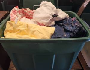lot 69 image: CONTAINER LOT OF ASSORTED CLOTHING AS SHOWN. NICE MIXED LOT SOME MAY HAVE TAGS.
