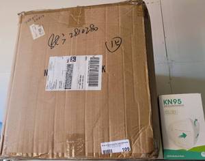 lot 109 image: CASE OF KN95 MASKS AS SHOWN. APPROX. 70 BOXES WITH 10 MASKS EACH.