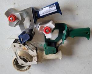 lot 199 image: TAPE GUNS AS SHOWN.