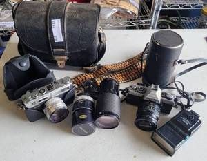 lot 230 image: VINTAGE 35MM CAMERA WITH LENSES AND ACCESSORIES AS SHOWN.