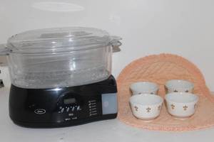 lot 4 image: Oster Two Tier Food Steamer and 4 Homer Laughlin Bowls