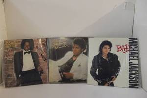 lot 1 image: Collection of Micheal Jackson LP Vinyl, Rare and Hard To Find Thriller Album with Co-Producer Error, Also Bad Album and Off the Wall, Good Condition,  See Photos