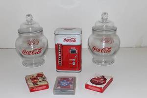 lot 17 image: Vintage Coke a Cola Collectors Items, Glass Lidded Canisters, Collectors Tin, and 2 Decks of Coke a Cola Playing Cards