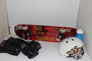 lot 29 image: Skatboarding Lot, Helmet, Knee and Elbow Pads and Skateboard