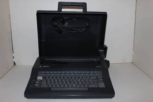 lot 34 image: Smith Corona SE100 Electric Typewriter, Tested Powers On and types