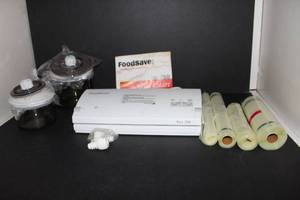 lot 102 image: FoodSaver System with paperwork
