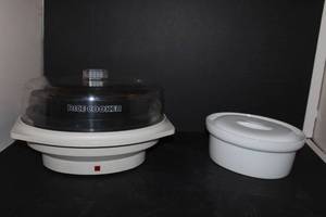 lot 131 image: Rival 44501 Rice Cooker and Steamer and White Lidded Oval Casserole Dishit is 10.25 long 8 wide and 4.5 Tall. Microwavem oven and dishwasher safe