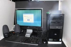 lot 132 image: Complete HP Desktop Computer System and accessories, see photos... Tested and reset to Factory Settings